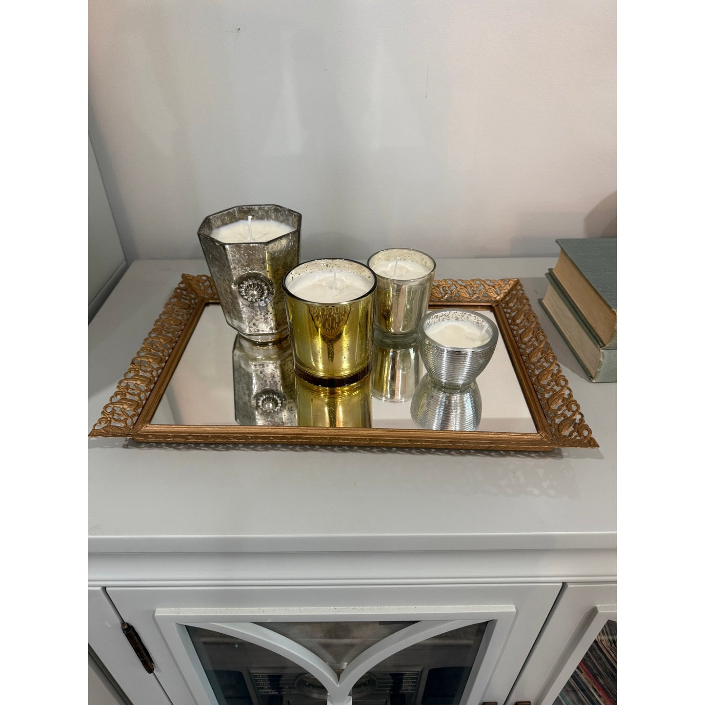 Candle collection on a vintage gold tray, lemon bergamot candle display