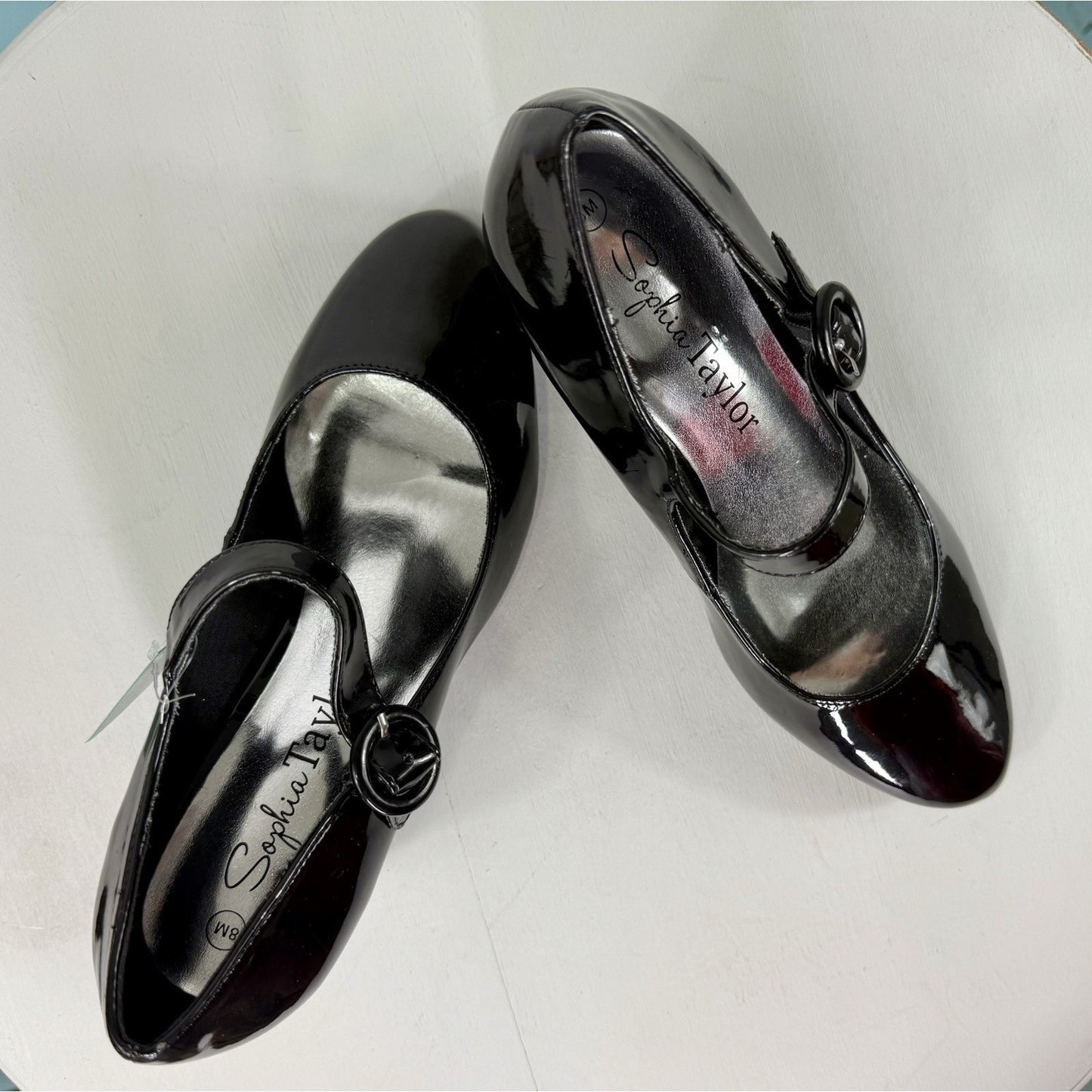 Sophie Taylor patent leather Mary Jane’s