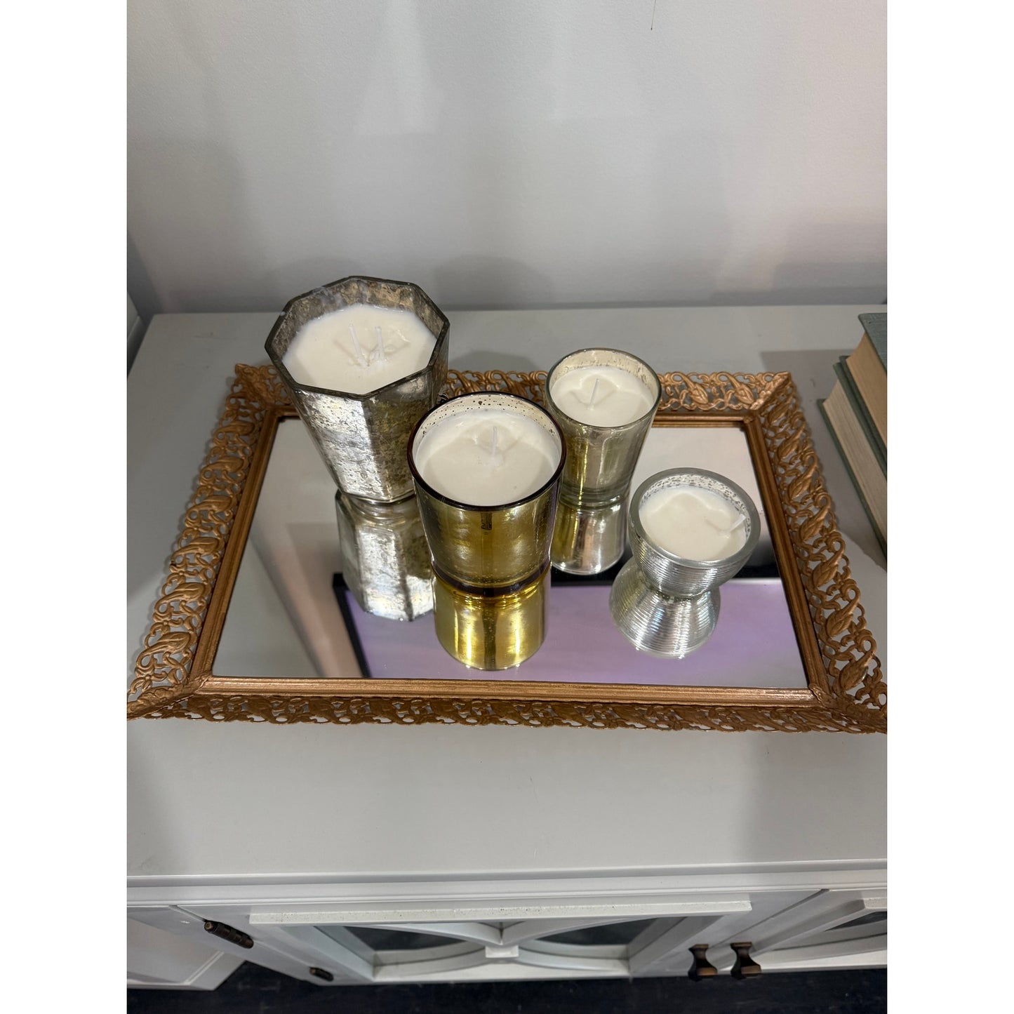 Candle collection on a vintage gold tray, lemon bergamot candle display