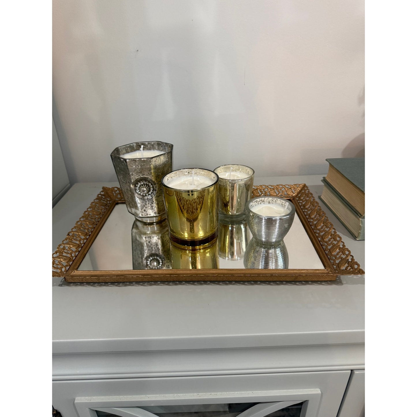 Candle collection on a vintage gold tray, lemon bergamot candle display