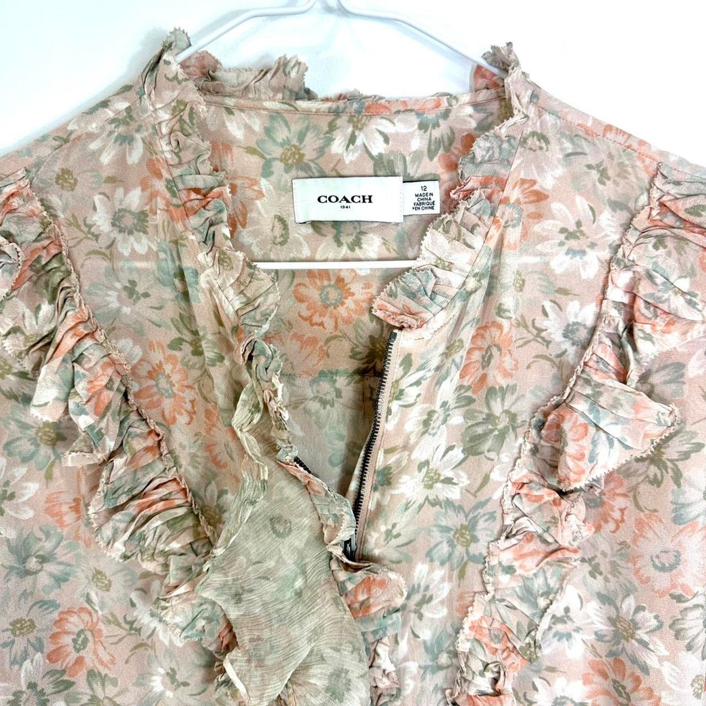 COACH Vintage  neutral pink and white floral silky shirt with ruffle and zip details